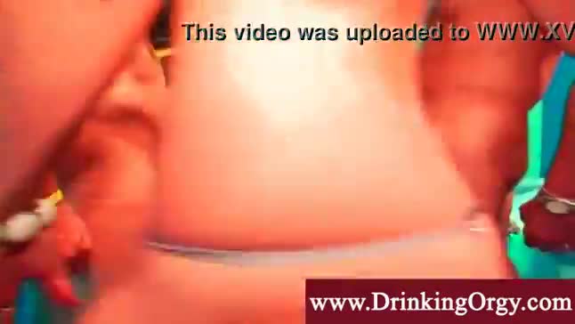 Blond licks pussy showered in champagne